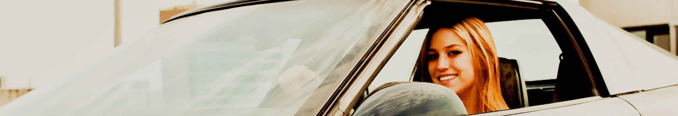 teenage girl driving a car